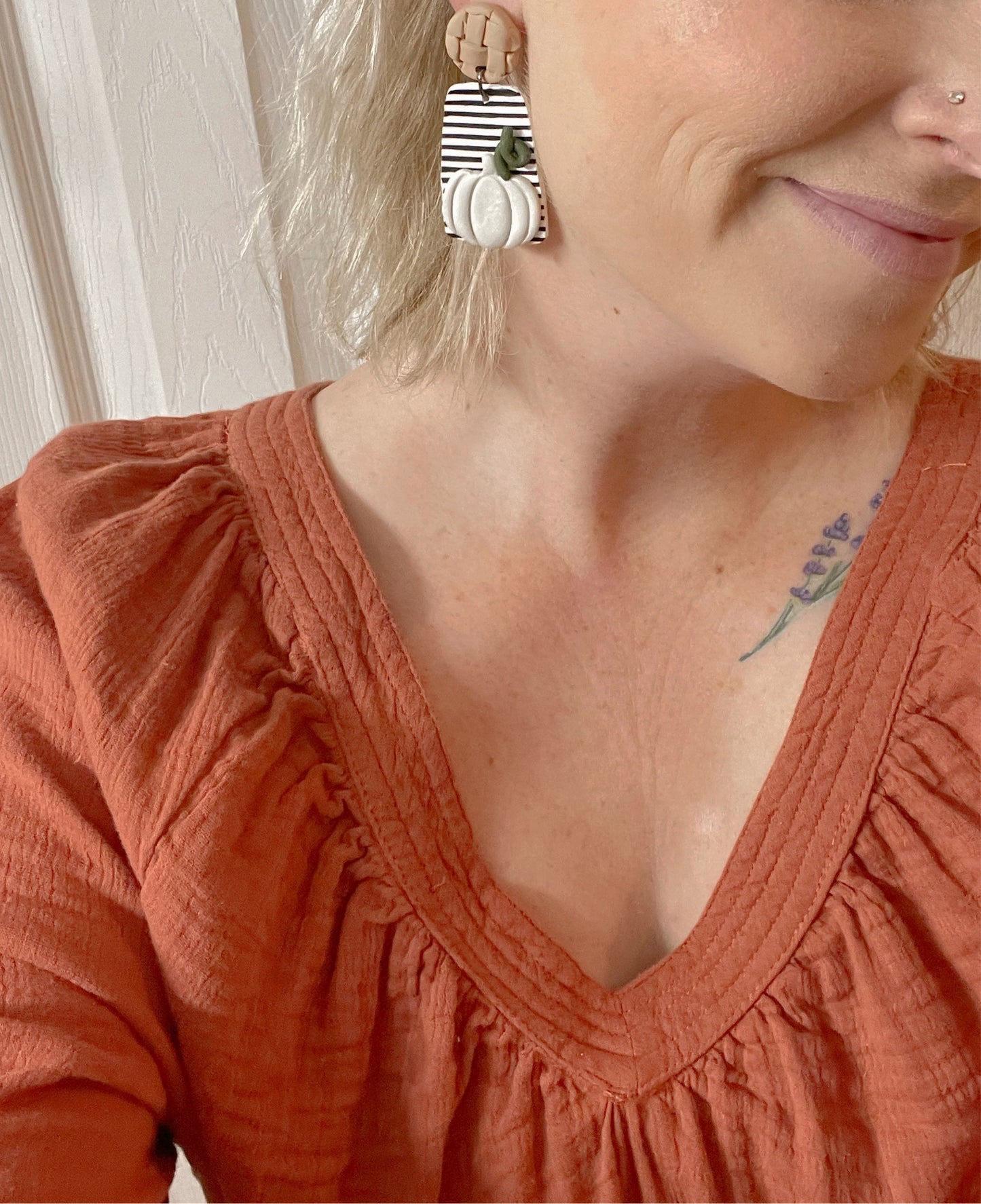 Striped pumpkin dangles with tan weave style