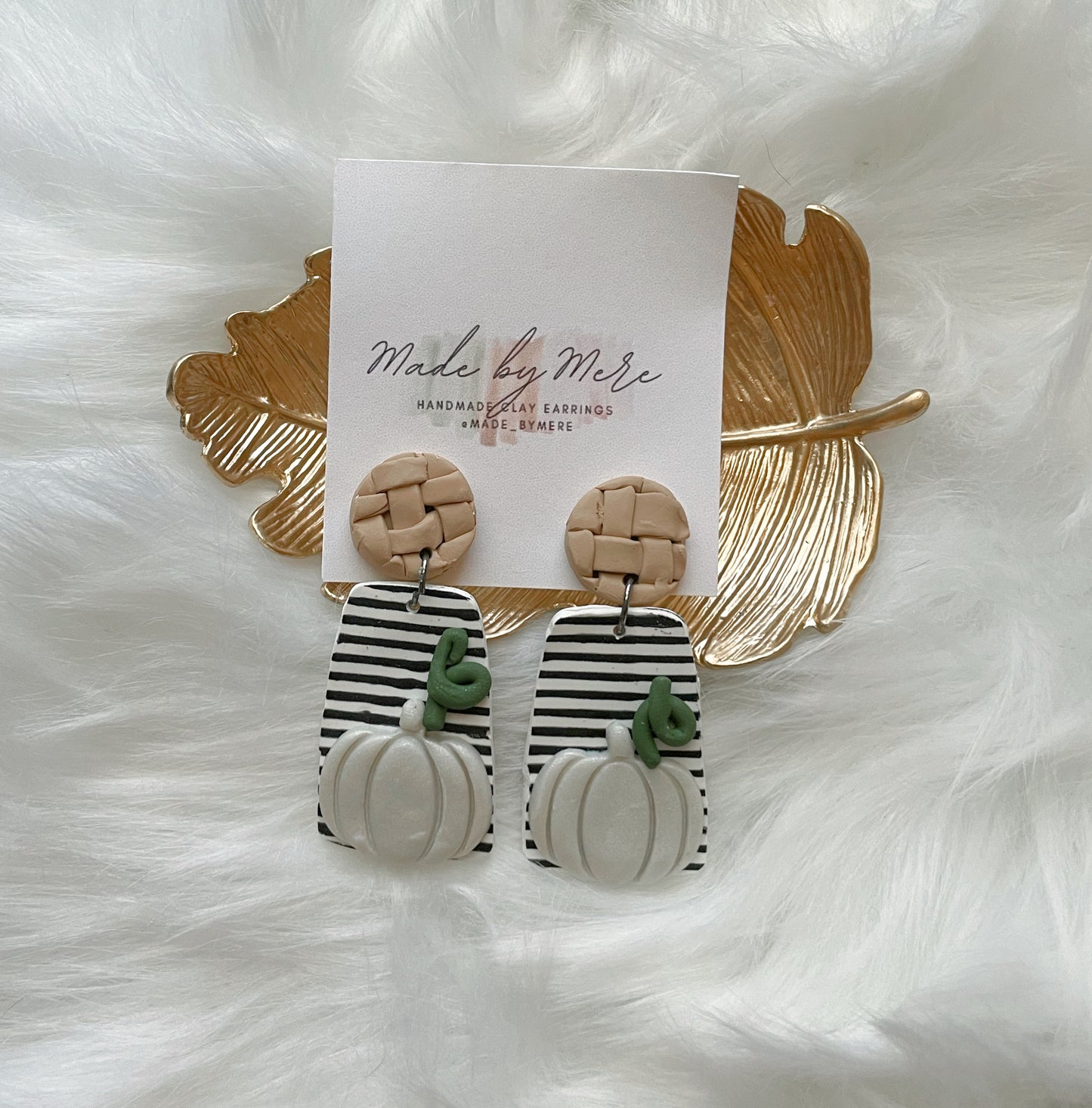 Striped pumpkin dangles with tan weave style