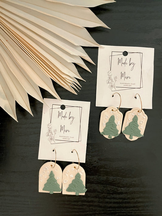 Green trees with snow ivory dangles